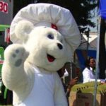 Mexico-based global bakery giant Grupo Bimbo, whose mascot Osito Bimbo is shown here at a company event in Mexico in 2011, is expected to be the new owner of Canada Bread before the end of May. (GrupoBimbo.com)