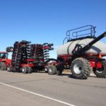How early of a spring will it be? A tractor and air seeder were spotted Tuesday travelling north on Highway 23 near Roland in south-central Manitoba. (Allan Dawson photo)