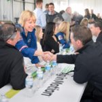 A member of STARS greets an exhibitor at Ag in Motion’s five-year celebrations on May 14, 2019. (William DeKay photo)