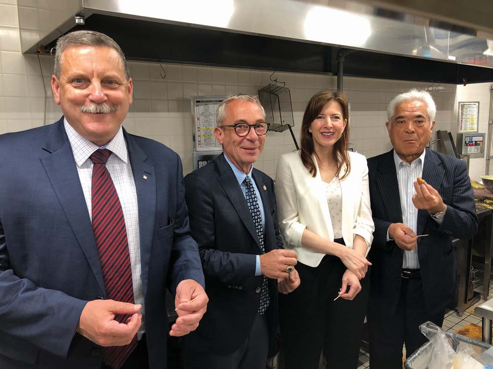 Connecting with customers such as Hideo Suzuki (far right), president for Belex chain of supermarkets in Japan, was a top priority for Alberta Canola director Andre Harpe (second from left) on a recent trade mission. Also pictured are Deputy Ag Minister Andre Corbould and Tanya Fir, the provincial minister of economic development, tourism and trade.