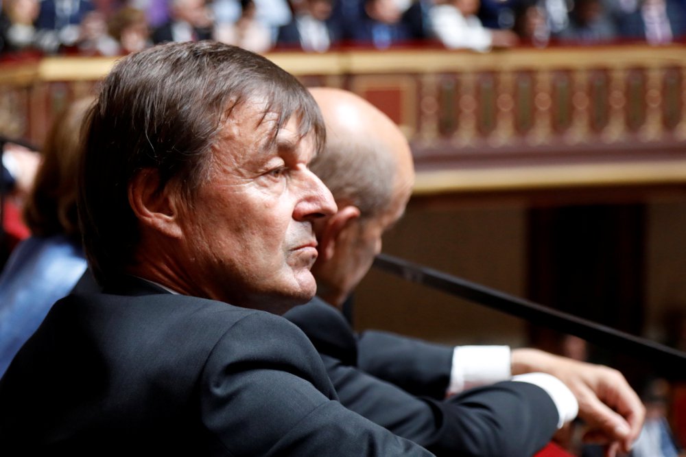 Nicolas Hulot listens to the speech of French President Emmanuel Macron on July 9, 2018.
 Photo: Reuters/Charles Platiau
