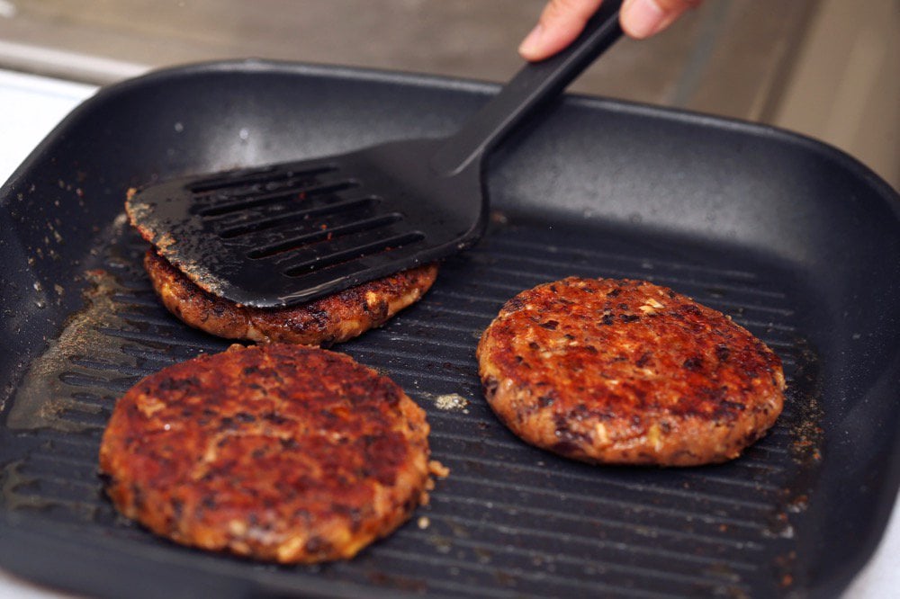 Bean burgers made with canola protein powder at Burcon’s alternative meats protein lab in Winnipeg, Manitoba, Canada August 23, 2019. Picture taken August 23, 2019. REUTERS/Shannon VanRaes
