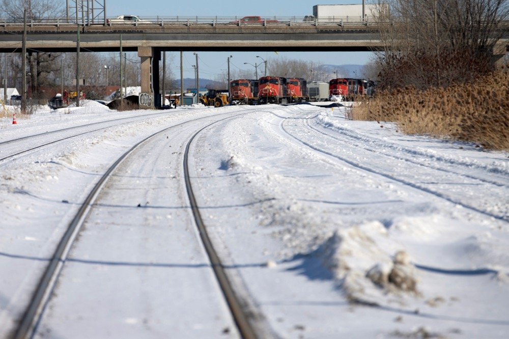 CN locomotives are seen on track near a railway blockade at St-Lambert, Que. on Feb. 20, 2020. (Photo: Reuters/Christinne Muschi)
