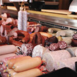 Germany is one country where a targeted growth strategy could pay dividends, says a new report from Farm Credit Canada. On the food side, Canada’s “stellar reputation” for food safety and quality provides an opening to sell more processed pork and beef products while the EU’s move away from palm oil gives canola oil opportunities in the biofuel market. (Pictured is a meat shop in Regensburg)
