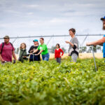 Variable-rate irrigation holds great promise but applying the technology is complicated, says Willemijn Appels, Lethbridge College’s Mueller Applied Research Chair in Irrigation Science. Appels (second from right) is pictured with students and researchers at one of five farms where her study on variable-rate irrigation is taking place.