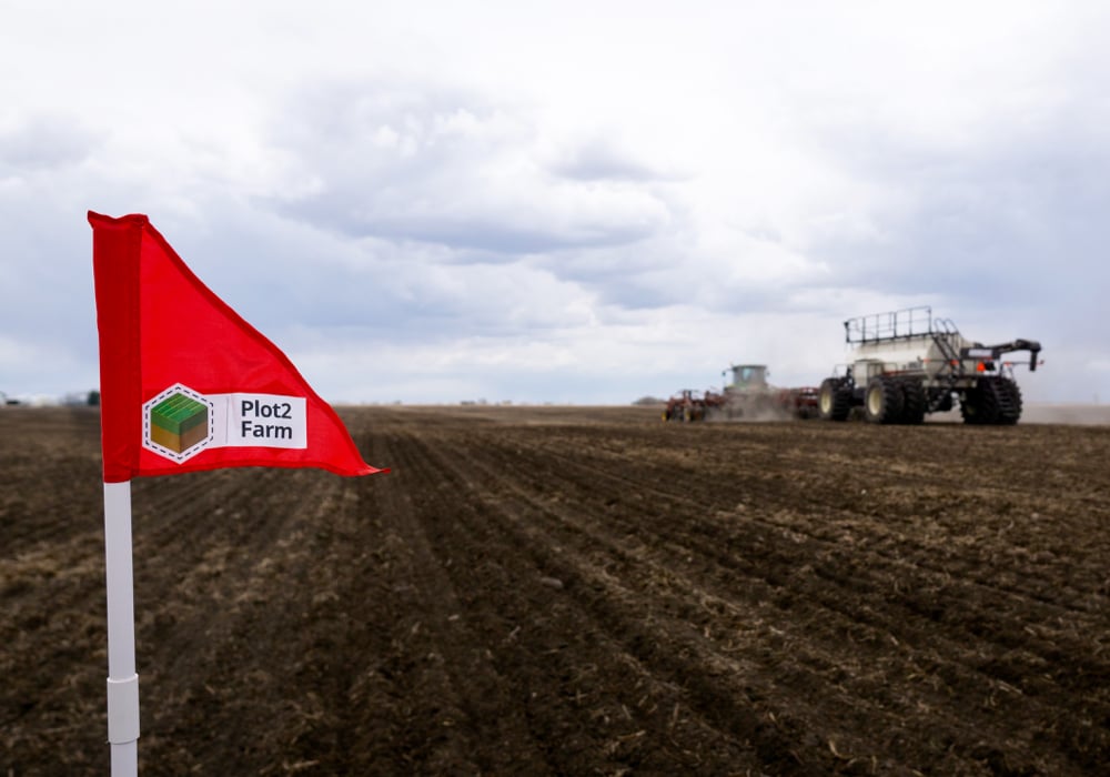 A flag is planted at each corner of each treatment in the Plot2Farm program so results can be accurately measured.