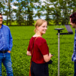 The focus of Old College’s new ‘techgronomy’ diploma program is making practical use of precision ag technology, says James Benkie (left), pictured with college staff Mytayla Miller and Bill Bruce examining field sensors.