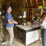 “Every time someone new tastes it, we get new customers,” says Lorraine Bannister (left), who began growing garlic as a retirement project with husband Kevin.