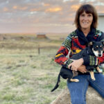 Sheila Hillmer, pictured here with dog Tucker, had a rough start in the cattle industry in 2021 but ended up feeling “fairly lucky.”