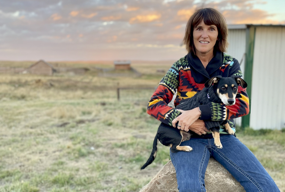 Sheila Hillmer, pictured here with dog Tucker, had a rough start in the cattle industry in 2021 but ended up feeling “fairly lucky.”