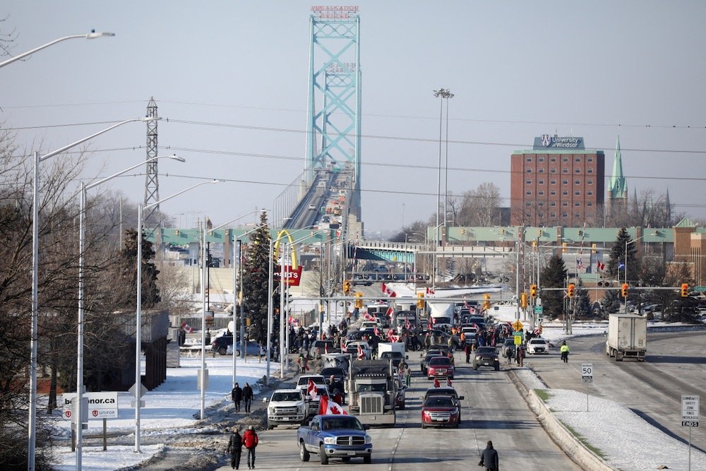 Protestors’ vehicles block the route leading from the Ambassador Bridge, linking Detroit and Windsor, on Feb. 8, 2022. (Photo: Reuters/Carlos Osorio)
