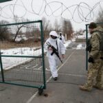 Members of the Ukrainian State Border Guard Service keep watch at the Kliusy checkpoint near the frontier with Russia in Ukraine’s Chernihiv region on Feb. 16, 2022. (Photo: Reuters/Valentyn Ogirenko)