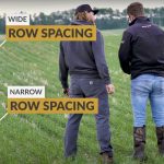 Grain grower Wade McAllister and agronomy specialist Jeremy Boychyn at a Plot2Farm trial on row spacing conducted at McAllister’s farm last year. In a video shot at the farm, Boychyn discusses the pros and cons of wide versus narrow row spacing, which is an optional parameter in a new seeding rate calculator put out by Alberta Wheat and Alberta Barley.