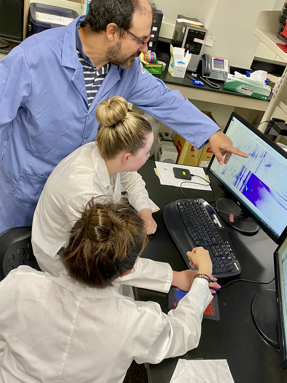 University of Alberta Professor James Harynuk and his colleagues Sheri Schmidt (middle) and A. Paulina de la Mata PhD (front) may be on the cusp of a significant breakthrough in the battle against wheat midge.