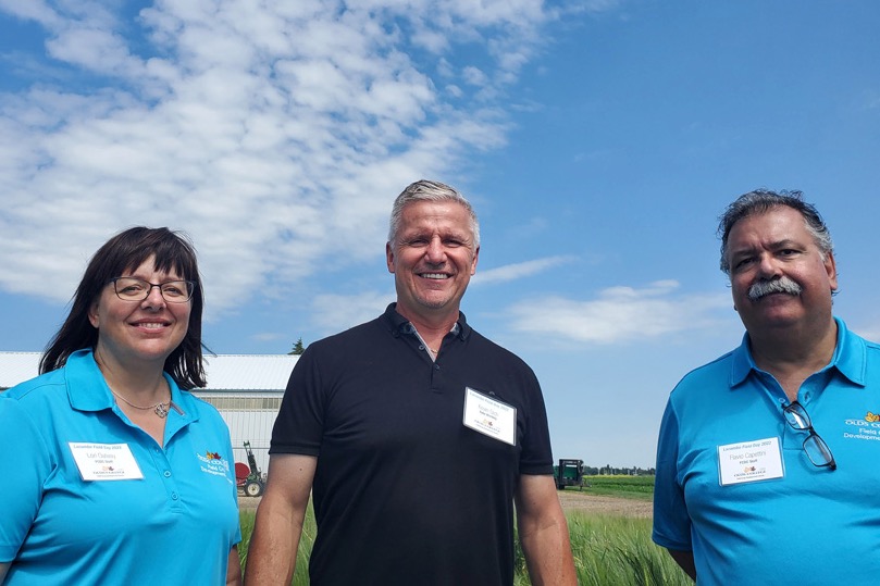 Plant breeders and customers spoke to the Olds College Lacombe Field Day on July 27. From left to right: Lori Oatway, Olds College; Kevin Sich, Rahr Malting, and Flavio Capettini,
Olds College.