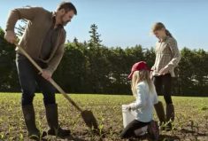 Ontario dairy producer Korb Whale, pictured with his two daughters, says the sector already has established practices and technology that can cut greenhouse gas emissions by 70 per cent.
