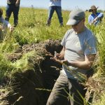 University of Alberta researcher Derek MacKenzie (foreground) wants his soil management app to also be a vehicle for carbon credit training and crowdsourcing management practices among producers.