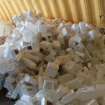 File photo of agricultural plastic containers collected for recycling.