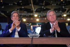 U.S. special presidential envoy for climate John Kerry and Agriculture Sectretary Tom Vilsack applaud U.S. President Joe Biden&#8217;s speech at the COP27 climate summit at Sharm el-Sheikh, Egypt on Nov. 11, 2022. (Photo: Reuters/Kevin Lamarque)
