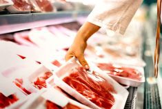 Buying meat at a supermarket