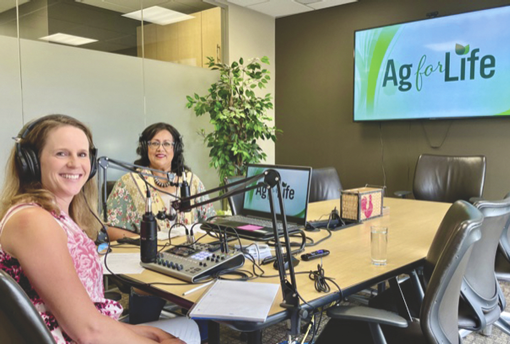Sharing stories is what Agriculture for Life does in its classroom work and that’s the same approach it takes to podcasting, says CEO Luree Williamson (on left, seen here talking about power line safety with Mona Bartsoff of FortisAlberta).
