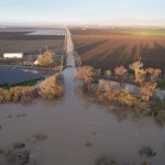 Flooding from the Salinas River forces the closure of a road at Salinas, California on Jan. 12, 2023. (Photo: Reuters/Nathan Frandino)