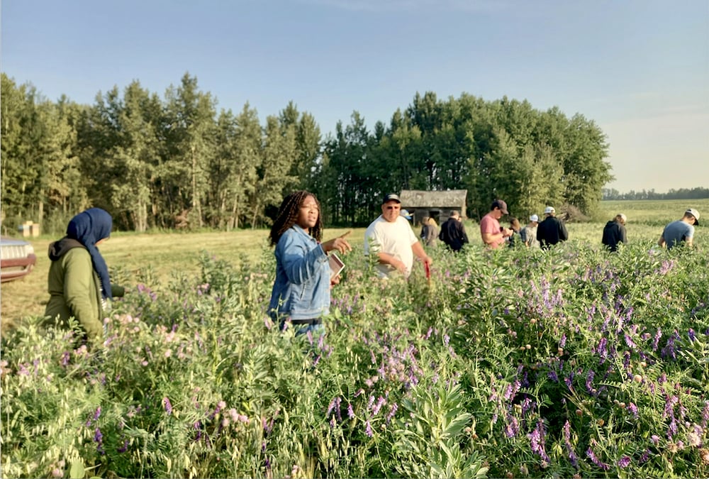 Linda Gorim (second from left) and her class at Shorty Fensky’s farm near Thorsby. Giving students the chance to get their hands dirty provides learning that a classroom alone simply can’t provide, says the assistant professor from the University of Alberta.