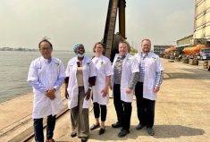 The welcome mat was rolled out everywhere for Bentley producer Jason Lenz, (second from right, seen here at the Dufil Prima Foods flour mill in Lagos) and his colleagues.