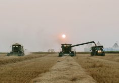 The combine team at KCL Cattle Company hard at work last fall. Co-owner Karleen Clark says a harvest free of weather delays — and as a result, virtually non-stop combining — helped create a recipe for worker fatigue.