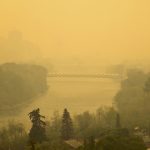 Smoke from Alberta’s active wildfires hangs over Calgary on May 16. Compounds released in forest fires can also lead to the formation of secondary pollutants in the air.