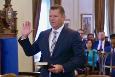 RJ Sigurdson, MLA for Highwood, is sworn in on June 9, 2023 as Alberta&#8217;s minister of agriculture and irrigation. (Government of Alberta video screengrab via YouTube)
