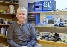 Brian Tischler in his “robot room” where he brings big concepts to life.