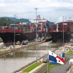 Container ships pass through locks on the Panama Canal in this file photo. (CIA.gov)