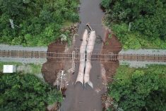 Water flows through a washed-out culvert on the CN rail mainline at Truro, N.S. on July 23, 2023. (Photo: Nigel Gloade/Millbrook First Nations/Handout via Reuters)