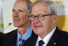 Canadian Agriculture and Agrifood Minister, Lawrence McCauley (right) and CCC vice president, crop production and innovation, Curtis Rempel at the funding announcement at the Bruce D. Campbell Farm and Food Discovery Centre at Glenlea, Man.
 Photo: Don Norman
