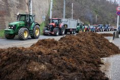 Farmers drive tractors in front of government office, where they dumped manure, during a protest against European Union agricultural policies, grievances shared by farmers across Europe, in Prague, Czech Republic, March 7, 2024. REUTERS/Eva Korinkova
