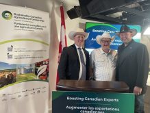 Left to right: Nathan Phinney, Canadian Cattle Association president, Lawrence MacAulay, federal ag minister, Eric Bienvenue, president of Canada Beef.