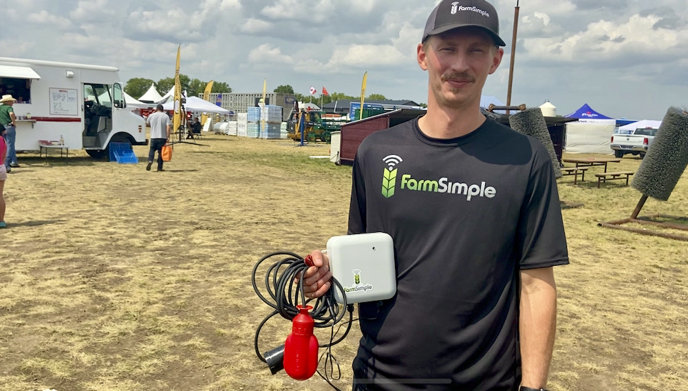 Katlin Lang is co-founder of FarmSimple Solutions, a company that provides a water trough sensor for remote watering system. He’s pictured here at last year’s Ag in Motion.
 Photo: John Greig
