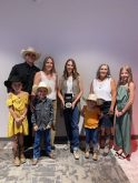 Cassie Marchand (centre) poses with the Schellenberg family, including Reg&#8217;s son Coy, daughter-in-law Laura-Lie, wife Shannon and grandchildren Ella, Nora, Ty and Faye. Photo: Canadian Cattle Association
