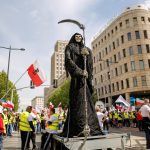 Protesters lead a model of reaper as Solidarity organisation and Polish farmers protest with Polish and Solidarity flags and anti Green Deal banners in front of European Parlament building in the centre of Warsaw, the capital of Poland on May 10, 2024. The protest in Poland is part of the European farmers’ protest against the EU’s Green Deal regulations. Polish farmers also demand a change to the EU agreement with Ukraine regarding the import of agricultural produce to the EU. The protest gathered over 100 thousand people. (Photo by Dominika Zarzycka/Sipa USA)