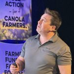 Tyler Wist from AAFC Saskatoon speaking at Manitoba AgDays 2025 about pests that affect canola. PHOTO: Don Norman