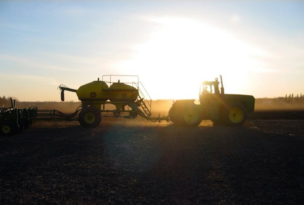 Some large-scale conventional farms are adopting practices typically seen at organic farms. Photo: Allan Dawson/File
