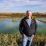 Dan Karran, an ecohydrologist and instructor in the Werklund School of Agriculture Technology at Olds College, is the principal investigator on a project that is testing floating islands, which contain native wetland plants. These floating islands have been shown to remove contaminants from cattle feedlot storm ponds.