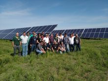 A group from Brazil recently visited Merlinds Farms’s solar panel, which has been set up to power a large-scale irrigation system.