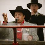 Auctioneer Casey Lawes at work. Screencap via Livestock Markets Association of Canada's Facebook page.