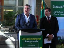 Saskatchewan premier Scott Moe, left, and Kody Blois, parliamentary secretary to the prime minister, participate in a press conference prior to their mission to China. Photo: Janelle Rudolph