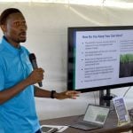 Semitone Amosu, researcher at Olds College, delivers a soil health seminar at the school's AgSmart Expo in July 2025.