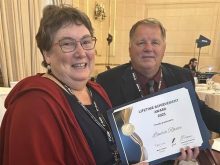 Laura Rance-Unger (left) with her Lifetime Achievement Award at the Canadian Farm Writers Federation 2025 awards banquet Sept. 20 in Winnipeg.