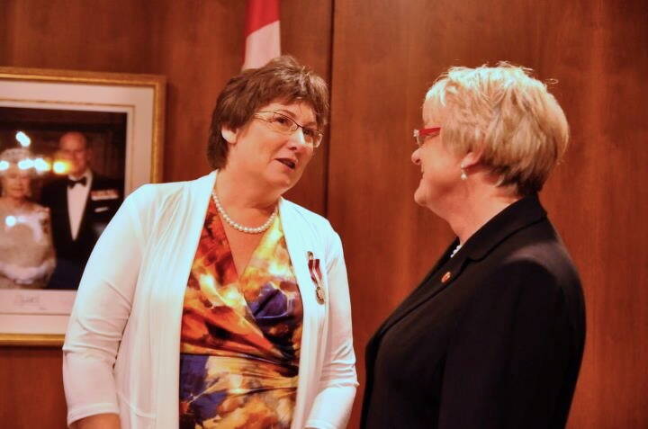 Laura Rance-Unger speaks to then Manitoba senator JoAnne Buth in 2012 after being presented with the Queen’s Diamond Jubiliee Medal. Photo: Laura Rance-Unger