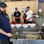 McCains representatives frying up some potatoes at Open Farms Days in Alberta at CP Farms